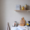 Kitchen shelf for decoration and pantry with white brackets made from iron and oak shelf